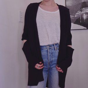 Black Mango cardigan with elbow cutouts